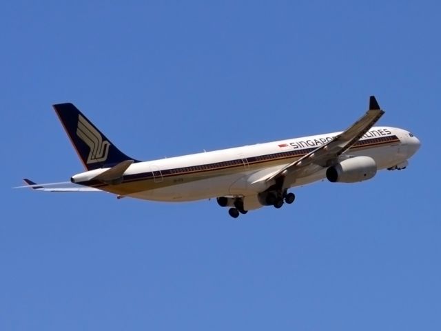 Airbus A330-300 (9V-STQ) - Getting airborne off runway 23 and heading home to Singapore. Monday 19th Dec. 2011