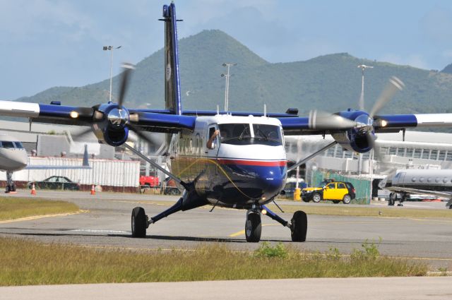 De Havilland Canada Twin Otter (PJ-WII) - Very Laid-Back Captain Of A Winair De Havilland Canada DHC-6-300 Twin Otter Outbound From St. Maarten. Must Think It Is OK To Fly With The Window Down To Get That Island Tan On Your Right Arm ???