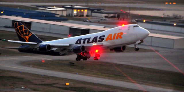 Boeing 747-200 — - Atlas Air, hauling Panalpina aargo, climbs out of Huntsville International Airport., Alabama.  Taken from photo plane, Cessna 140, Feb 2012.  Photo copyright: BlakeMathis.com