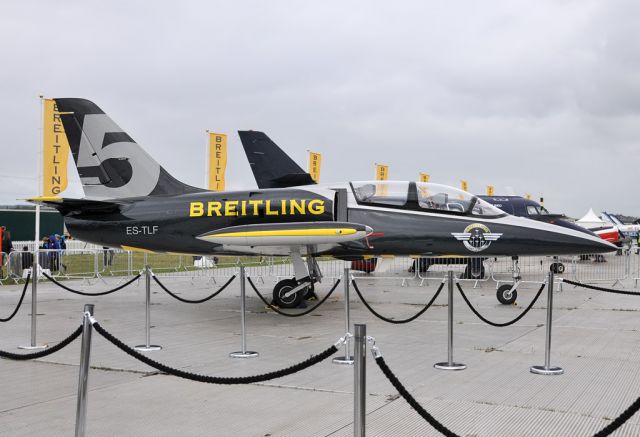 ES-TLF — - Breitling Jet Team #5 sitting as static display at 2012 Farnborough International Air Show.