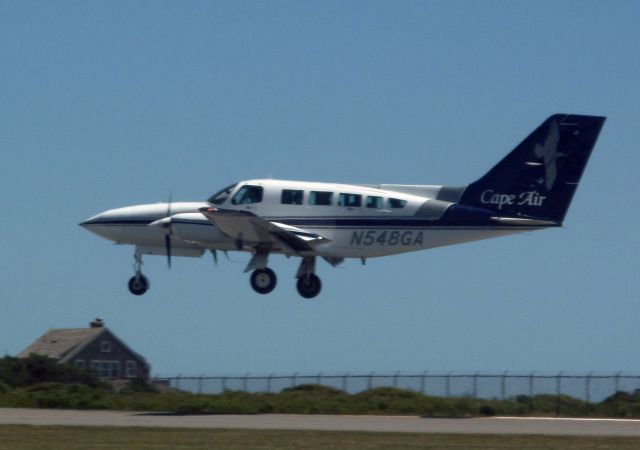 Cessna 402 (N548GA) - Landing runway 06 at Nantucket. These pilots are professionals.