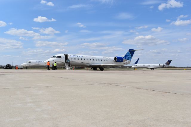 Canadair Regional Jet CRJ-200 (N431SW) - Busy day at MCW.  Multiple SkyWest CRJ-200s at the terminal!