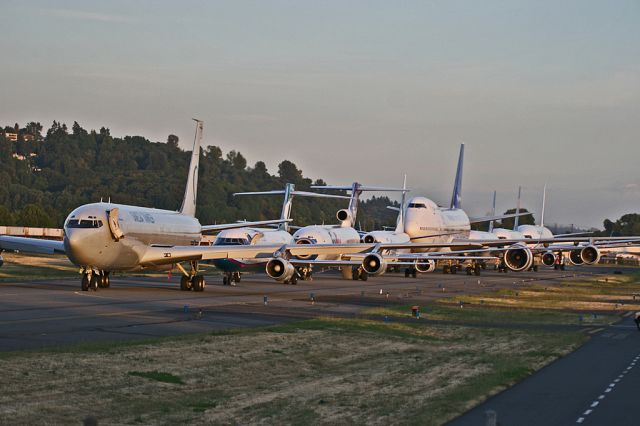— — - On the day of July 8, 2007 (787 Day) all the Boeing aircraft types were lined up for the guest of honor. Sadly she wasn't going to arrive. Still a pretty shot with them all lined up. Omega Tanker 707, Air Tran 717, FedEx 727, Alaska Airlines 737, Rolls Royce 787 Flying Test Bed 747, Continental Airlines 757, Delta Airlines 767, and Air France 777.