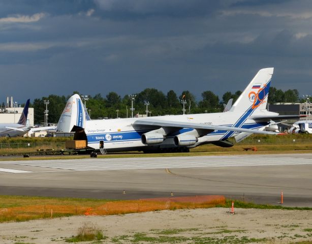 Antonov An-12 (RA-82081) - Offloading cargo through nose