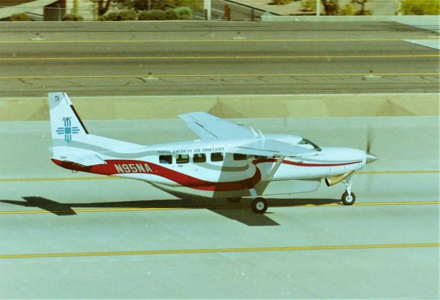 Cessna Caravan (N95NA) - KPHX - April 1999 from the mid terminal parking structure, Native American Air Ambulance on taxi to departure. I love the huge exhaust stack on the engine. ( from rzjets dd 6/98 Native American Air Services)