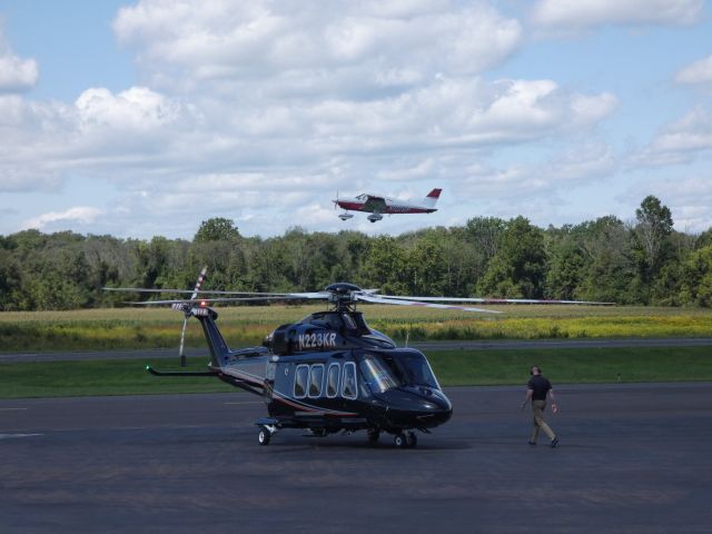 BELL-AGUSTA AB-139 (N223KR) - A brief stop on the tarmac for this 2013 AgustaWestland 139 Rotorcraft while a Piper Cherokee departs in the Summer of 2019.