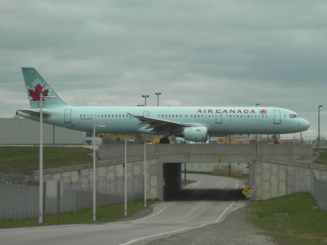 Airbus A321 (C-GJWO) - Taxiing for departure on runway 06L