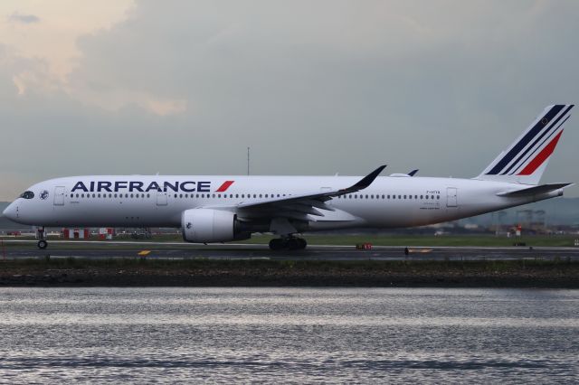 Airbus A350-900 (F-HTYQ) - Air France departing BOS for Paris after thunderstorms moved through the area on 9/9/23.