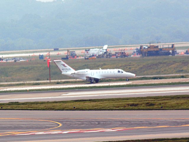 Cessna Citation CJ3 (N779JS) - Taking Off 20C on 5/19/2013