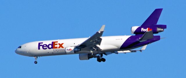 Boeing MD-11 (N523FE) - NEWARD AIRPORT-NEWARK, NEW JERSEY, USA-FEBRUARY 08, 2023: Seen by RF over Linden Airport at approximately 1523 EST, shortly before landing at Newark International Airport, about 5 miles away.