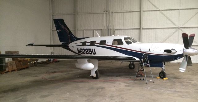 Piper Malibu Mirage (N6085U) - In the Hanger for Work.