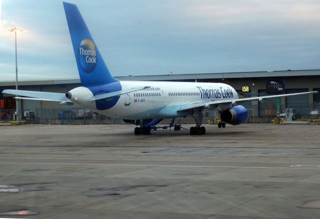 Boeing 757-200 (G-JMCG) - Thomas Cook - B757-2G5 (G-JMCG). Photo taken after landing at LGW from NCL taxiing to LGW North Terminal on board British Airways B737-436SF (G-GBTA). (Photo Feb 2005)