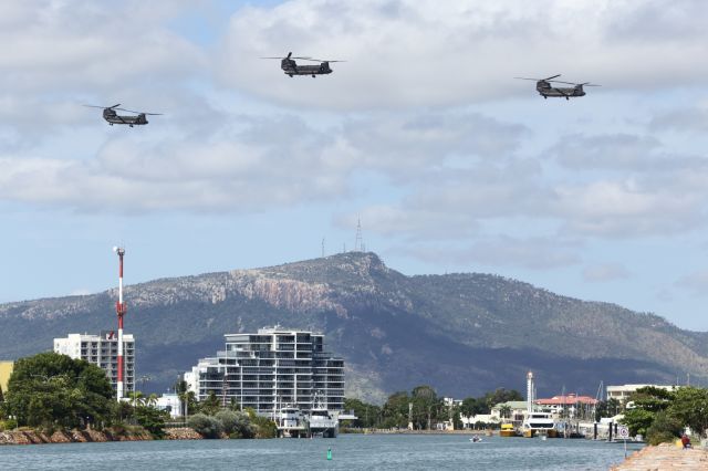 — — - Australian Army CH47, flypast. Mt Stuart is in the background.
