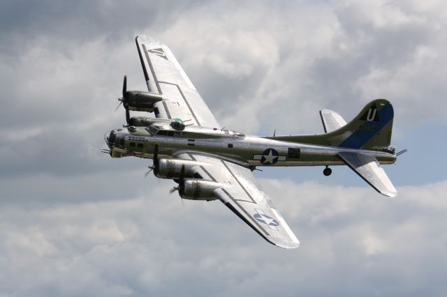 Boeing B-17 Flying Fortress — - even on a cloudy day this aircraft is so beautiful to photograph,taken at Great Lakes Airshow,june 30,2013