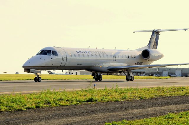 Embraer ERJ-145 (N16951) - United Express ERJ-145 awaiting clearance to enter Rwy 25 for its daily journey to EWR/KEWR.