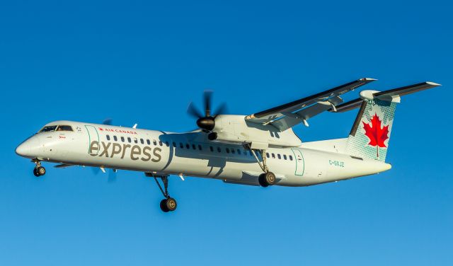 de Havilland Dash 8-400 (C-GXJZ) - JZA8933 arrives from Greater Moncton Intl, on short finals for runway 24L at YYZ