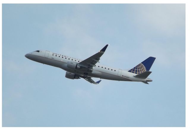 Embraer 170/175 (N116SY) - From the 9th floor balcony of the Best Western Plus on Central Ave.