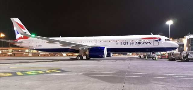 Airbus A321 (G-NEOX) - Dec 31, 2019. Only a week in service, looking shiny on Stand 201