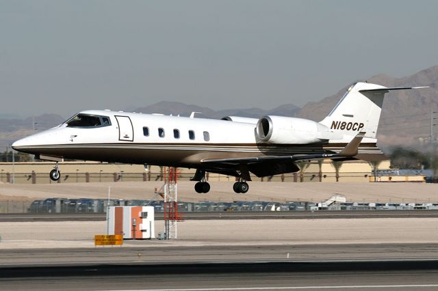 Learjet 60 (N180CP) - Peters Corporation 1996 Bombardier Learjet 60 N180CP landing RWY 25L. [Photo taken 12-31-2006]