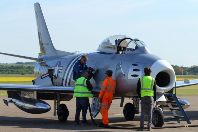 — — - Refuelling after putting on a spectacular flight display, at Duxford.