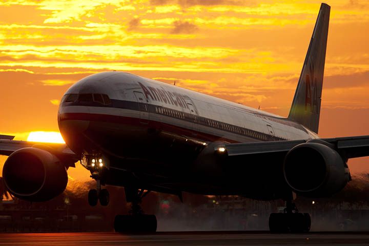 Boeing 777-200 (N774AN) - 1/29/13:  American B777-223ER N774AN flight 2434 landing on 9 at sunset after a flight from Sao Paulo, Brazil.