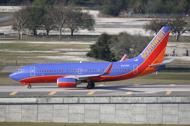 BOEING 737-300 (N422WN) - Southwest Flight 789 (N422WN) taxis for departure from Tampa International Airport prior to a flight to New Orleans International Airport