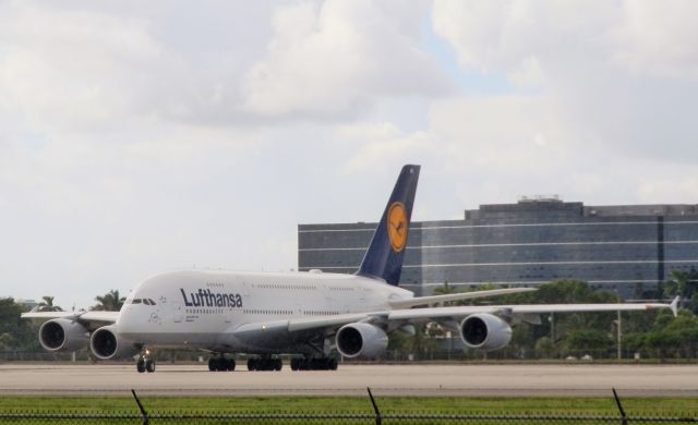 Airbus A380-800 (D-AIMK) - Departing in a "Late afternoon shower!!"