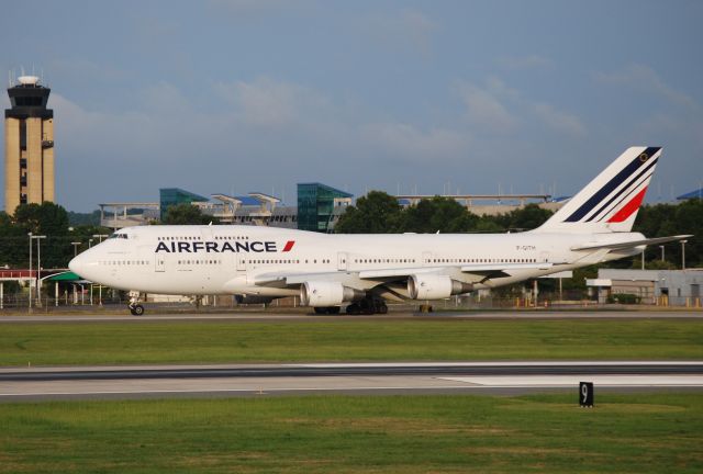 Boeing 747-400 (F-GITH) - Taxiing to 18C after a 2-hour wait on the ramp, having been diverted due to storms in route to KATL - 7/18/15