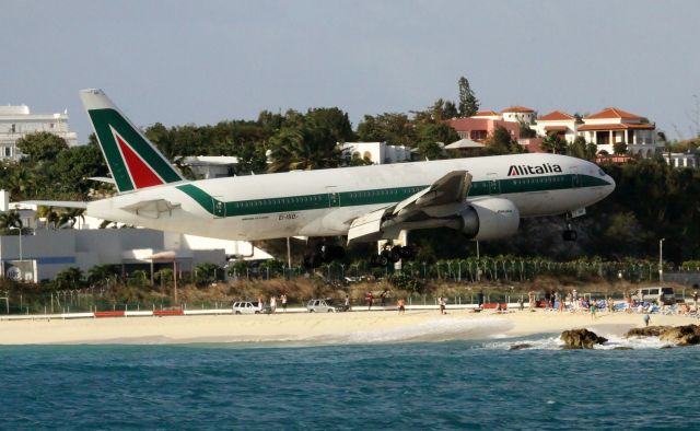 Boeing 777-200 (EI-ISD) - Alitalia EI-ISD on short final over maho beach on St Maarten