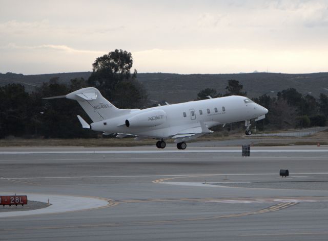 Bombardier Challenger 300 (N549XJ) - KMRY - Challenger 300 departing 10R at Monterey - this jet had quite a group board at the Monterey Jet Center - Im sure all seats were full! 5-14-2015