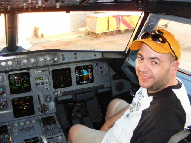 Airbus A320 (N335NW) - Thanks to the captain, I was able to get a cockpit tour of this Northwest Airbus A320 after we arrived in Memphis.