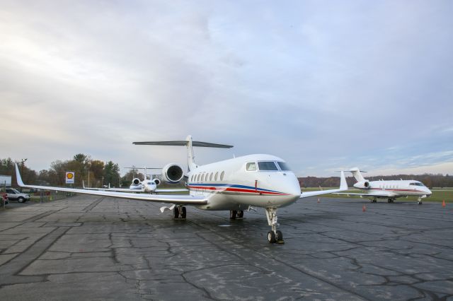 Gulfstream Aerospace Gulfstream G650 — - 5 Business Jets, ranging from Challenger 300 to your larger G650, sit on the Terminal Ramp at KPOU.