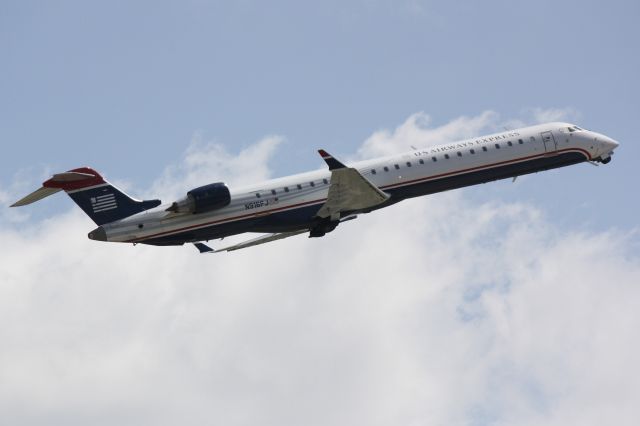 Canadair Regional Jet CRJ-900 (N916FJ) - Mesa/US Air Flight 2662 (N916FJ) departs Runway 14 at Sarasota-Bradenton International Airport enroute to Charlotte-Douglas International Airport