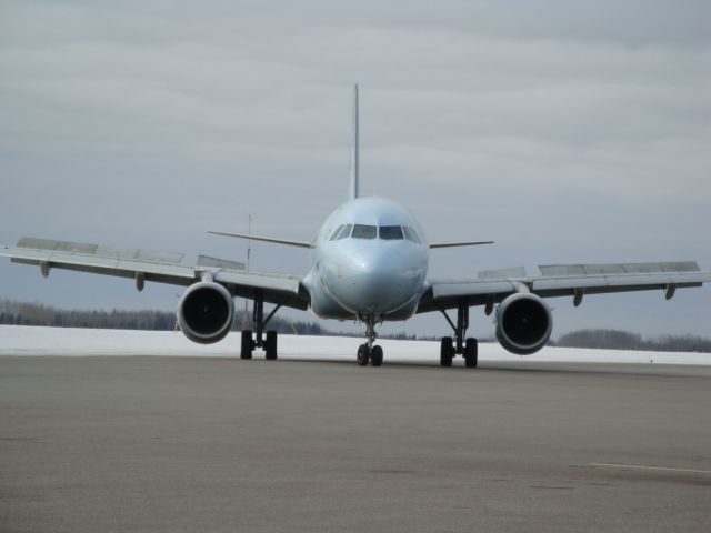 Airbus A319 (C-FZUG) - Air Canada A319 with spoilers still deployed at CYMM