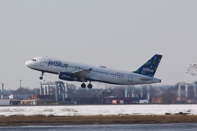 Airbus A320 (N537JT) - New Jet Blue tail departing Logan for Cancun on 02/18/07. 