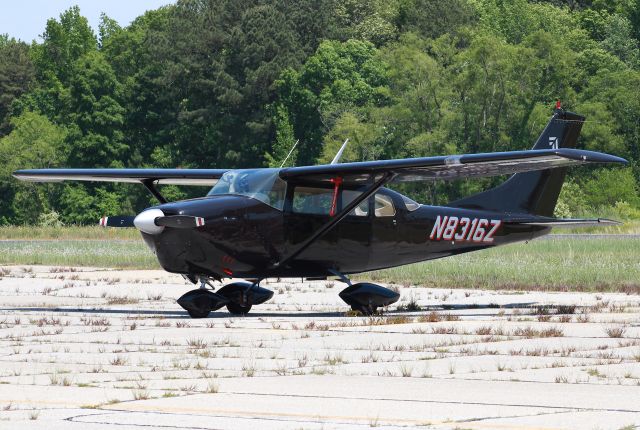 Cessna 205 (N8316Z) - 1963 Cessna 210-5A Centurion. Photo taken on 5/9/2021.