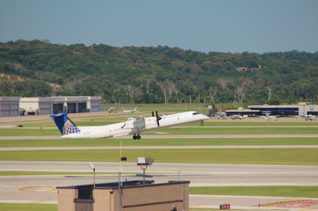 de Havilland Dash 8-400 (N204WQ) - 081415 United to Denver rotating Rwy 14R