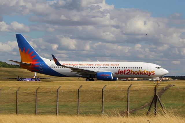 Boeing 737-800 (G-JZBD) - Jet2 (LS) G-JZBD B737-8MG [cn63159]br /Birmingham (BHX): Jet2 flight LS1240 taxis to the threshold of runway 15 for departure to Antalya (AYT). Wearing Jet2’s alternate ‘Jet2 Holidays’ livery, which is based on Allegiant Air (G4) livery, a throwback to earlier aircraft leasing from the US carrier.br /Taken from the end of Runway 15 Sheldon Country Park.br /2018 07 31br /a rel=nofollow href=http://alphayankee.smugmug.com/Airlines-and-Airliners-Portfolio/Airlines/EuropeanAirlines/Jet2-LS/https://alphayankee.smugmug.com/Airlines-and-Airliners-Portfolio/Airlines/EuropeanAirlines/Jet2-LS//a