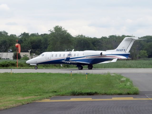 Learjet 45 (N441FX) - Holding short runway 05.