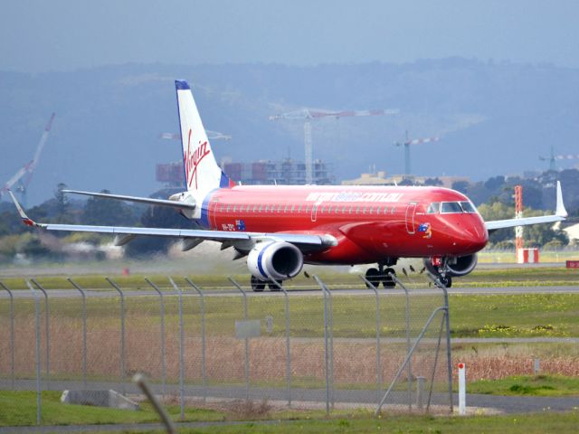 Embraer ERJ-190 (VH-ZPC) - On taxi-way heading for take off on runway 05. Thursday 12th July 2012.