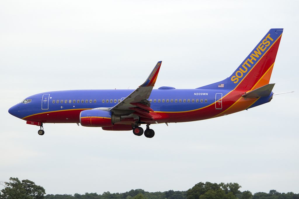 Boeing 737-700 (N209WN) - It's almost never too gloomy for aviation photography. July 2013. 