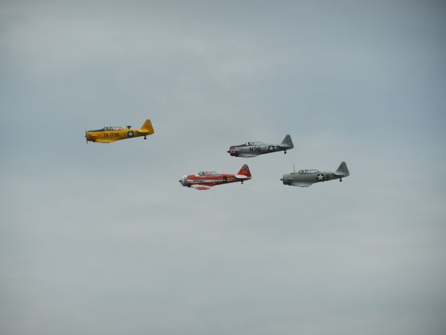 North American T-6 Texan (N66TY) - T-6 Texans, N66TY, N5199V, N9801C, and N36 in formation, they split up from a 14 Texan Flyover, then met back up as a group, then broke formation to land