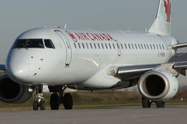 Embraer ERJ-190 (C-FHNX) - April 29, 2010 - leaving terminal in London on its way to runway 33 threshold for take off to Calgary