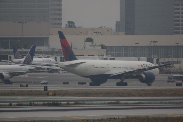 BOEING 777-200LR (N706DN) - TAXING TO RWY