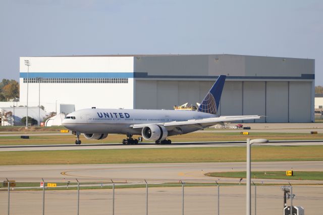 BOEING 777-200LR (N74007) - United 777 in old colors. NFL Charter.