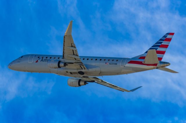 Embraer 175 (N235NN) - An American Eagle ERJ175 taking off from PHX on 2/11/23 during the Super Bowl rush. Taken with a Canon R7 and Canon EF 100-400 II L lens.