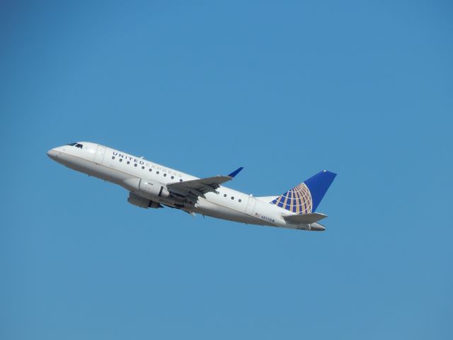 Embraer 170/175 (N855RW) - Shuttle America E170 departs EWR. Taken from Ikea adjacent to airport.