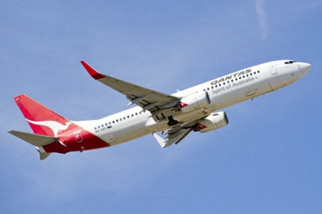 Boeing 737-800 (VH-VXS) - Heading skywards off runway 23. Thursday 4th April 2013.