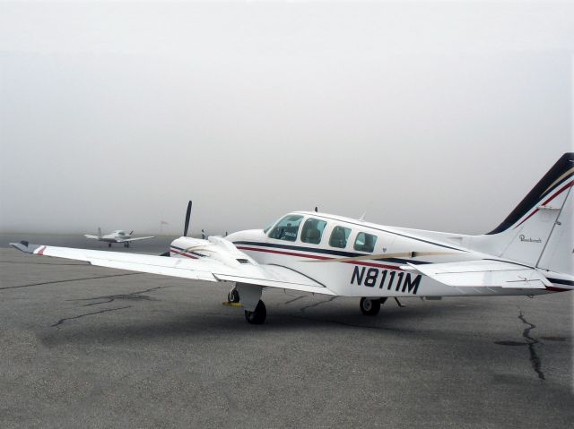 Beechcraft Baron (58) (N8111M) - At Rockland, ME.