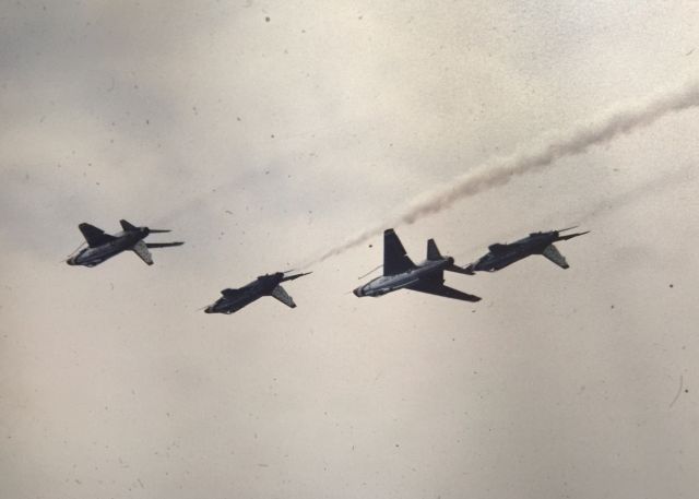 — — - Four USAF Thunderbirds F-100 Super Sabres performing at Rimini Miramare Airport (Italy) during the spring or summer of 1967. Photo is from a color slide taken by my father while he was stationed at Rimini Airbase with the Detachment 2700 7232nd Munitions Maintenance Group and with the Italian 5A Aerobrigata.